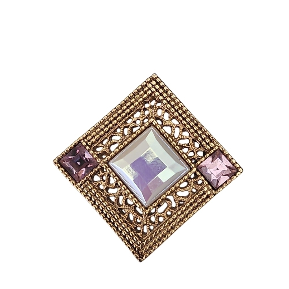 Ornate Gold and Purple Diamond Brooch with Central Gemstone